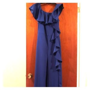 Blue one piece romper with side ruffle